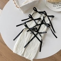 White ribbed knit leg warmers with black satin bows in a sweet ballet style - One Size / White With Black Bow