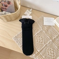 Schwarze Socken mit Schleife und Spitzenrand im dekorativen Lochmuster-Design - Einheitsgröße / Schwarz