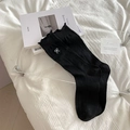 Chaussettes hautes noires style ballet avec nœuds blancs et bords à volants doux - Taille unique / Noir