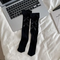 Chaussettes hautes Lolita noires avec nœuds décoratifs et détails ajourés élégants - Noir