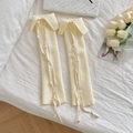 Japanische Beinstulpen in Creme mit Waffelstrickmuster, Schnürbogen und Kragendetails - Beige
