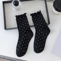 Sweet black crew socks with white polka dots and delicate ruffle trim for daily wear - One Size / Black Dots