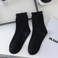 Classic black crew socks with elegant ruffle cuffs for women in a minimalist style - One Size / Solid Black
