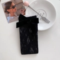 Schwarze Spitzenkniestrümpfe mit Samtschleifen und elegantem floralem Netzmuster - Schwarz