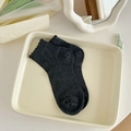 Dark grey knitted ankle socks with lettuce trim edges and vertical ribbed texture - One Size / Dark Gray