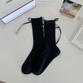 Chaussettes mi-hautes noires à côtes avec nœud en ruban de soie style ballet - Noir
