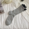 Calze da donna in tonalità grigio e grigio scuro con bordo arrotolato e maglia a costine - Taglia unica / Grigio chiaro
