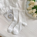 White frilly crew socks with bow jacquard pattern in sweet Japanese lolita style - Bleached White