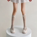 Sweet white lace knee-high mesh socks featuring delicate bow details and openwork pattern - One Size / Beige