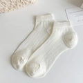 Minimalist white ribbed knit low cut ankle socks for women with soft cotton texture - One Size / Off-white