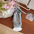 Grey pleated leg warmers featuring lace bows in a vintage French aesthetic style - One Size / Gray