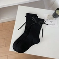 Chaussettes hautes noires style japonais avec nœuds latéraux et texture tricotée - Nœud Assorti / Noir