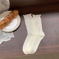 White pointelle knit socks with ruffled edges and hollow heart patterns in retro style - One Size / Small Diamond Quilted