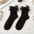 Black Lolita style socks with double-layered mesh ruffle trim and knitted texture - One Size / Black