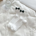 Calze Lolita bianche a rete con bordo in pizzo e piccoli fiocchi neri decorativi - Taglia unica / Bianco