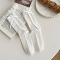 Sweet white crew socks with satin bow ribbons and vertical ribbed texture in ballet style - One Size / Bleached White