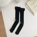 Minimalist black over-the-knee knit socks featuring a vertical ribbed texture and solid finish - One Size / Black