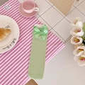 Japanese style light green Lolita mid-tube socks featuring a large decorative satin bow - One Size / Green