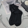 Schwarze Vintage Baumwollsocken mit zarter Spitze und eleganten vertikalen Rippenmustern - Wellenmuster Schwarz