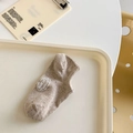 Oatmeal color low-cut invisible sock with colorful speckles and circular logo tag - One Size / Brown