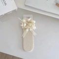 Calze al ginocchio crema con cuori traforati, grande fiocco di raso e perla - Taglia unica / Beige