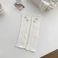 White knitted leg warmers with silver stars and pink ribbon tassels in a sweet style - One Size / White With Star