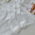 White Lolita-style mid-calf socks with delicate lace trim and hollow dot patterns - Polka Dot Stripes White
