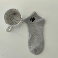 Women's grey speckled knit ankle socks featuring a cute black dog embroidery detail - Gray