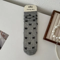 Grey mid-calf socks with black bow patterns and ruffled cuffs in premium knit - One Size / Grey All-over Bows