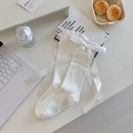 White cotton knee-high socks featuring a large satin bow in a sweet Lolita style - White