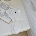 White cotton mid-calf socks with vertical ribbing and small black heart embroidery - One Size / White With Black Heart