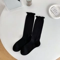 Solid black cotton crew socks featuring elegant ruffled edges in a minimalist flat lay - Ruffle Trim Without Bow / All Black
