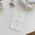 White ribbed knit leg warmers with delicate 3D butterfly appliqués and wavy edges - One Size / All White