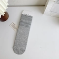 Solid grey knit crew socks in ribbed cotton with cozy minimalist aesthetic style - One Size / Light Gray