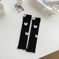Black knit leg warmers with pink 3D butterflies, perfect for balletcore and JK fashion style - One Size / Black Base Pink Bow