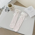 Sweet pink mesh socks featuring large lace bows and hollow dot pattern for women - One Size / Light Pink