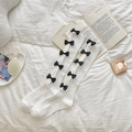 Lolita style white knee high socks with black bows on soft knit fabric for girls - White Ten Pairs Bowknot Over-Knee Style (XN329)