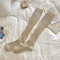 Chaussettes hautes côtelées classiques en kaki clair pour un style minimaliste - Taille unique / Vert