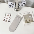 Light gray slouch socks in Mary Jane style with ribbed cuffs and a minimalist aesthetic - One Size / Gray