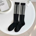 Chaussettes hautes en résille grise et tricot noir avec des motifs à pois élégants - Patchwork Noir