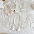 Cozy cream white over-the-knee knit socks featuring fine ribbed texture for winter - One Size / White