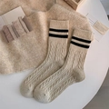 Thick beige wool socks with cable knit texture and black double stripes in a cozy style - One Size / Khaki