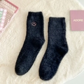 Thick black plush thermal socks with pink smiley face embroidery and soft mink-like texture - One Size / Black