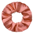 Silky coral pink satin scrunchie with pleated texture for premium hair styling - Coral