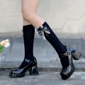 Black Mary Jane platform heels styled with pearl lace bow knee high socks for women - One Size / Black