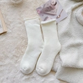 Thick warm white plush thermal socks for women with cozy fleece lining and rolled cuffs - One Size / White