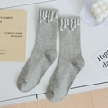 Light grey knit crew socks featuring white faux pearl fringe details for women - One Size / Gray