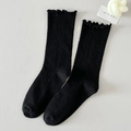 Japanese style black crew socks featuring ruffle trim and textured diamond knit patterns - One Size / Black
