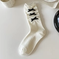 White frilly crew socks featuring elegant black velvet bows in a sweet Lolita style - One Size / White Base Black Bow