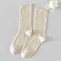 Sweet cream hollow knit crew socks with delicate ruffle trim and mesh pattern design - One Size / Off-white